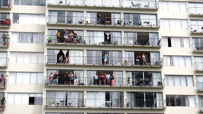 Vancouver building with people on balconies