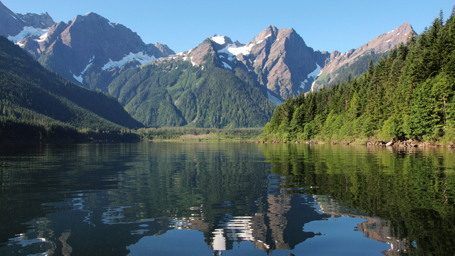 lake with mountain in the background