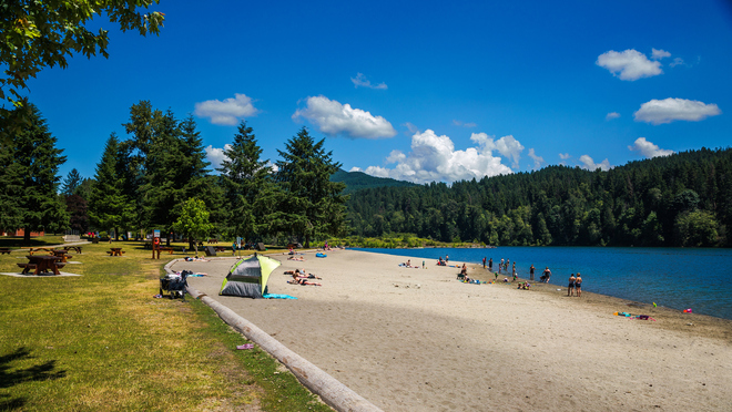 beach with blue sky at a lake