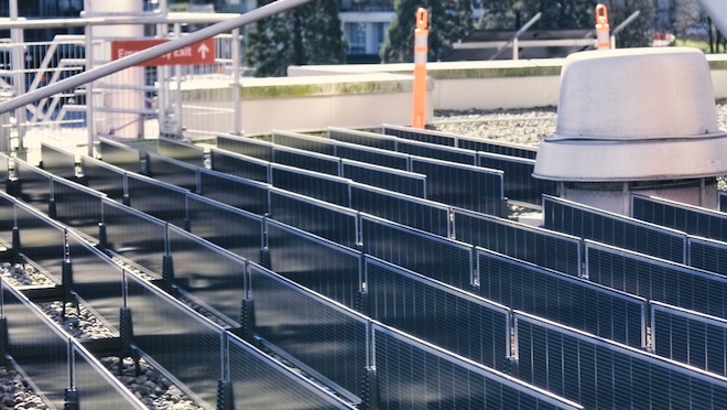 A series of long rectangular solar panels, designed to capture sunlight and turn it into energy. 