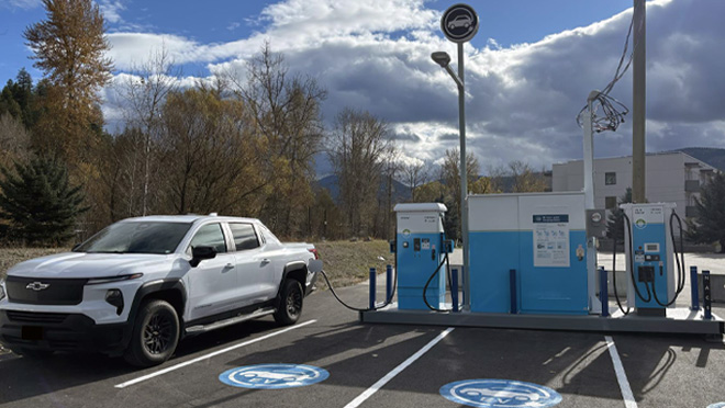 Portable EV charge site installed in a paved parking lot at the Lumby Curling Rink in Lumby, B.C.