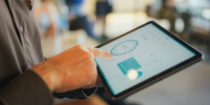 Staff using a digital tablet to control the temperature and illuminant