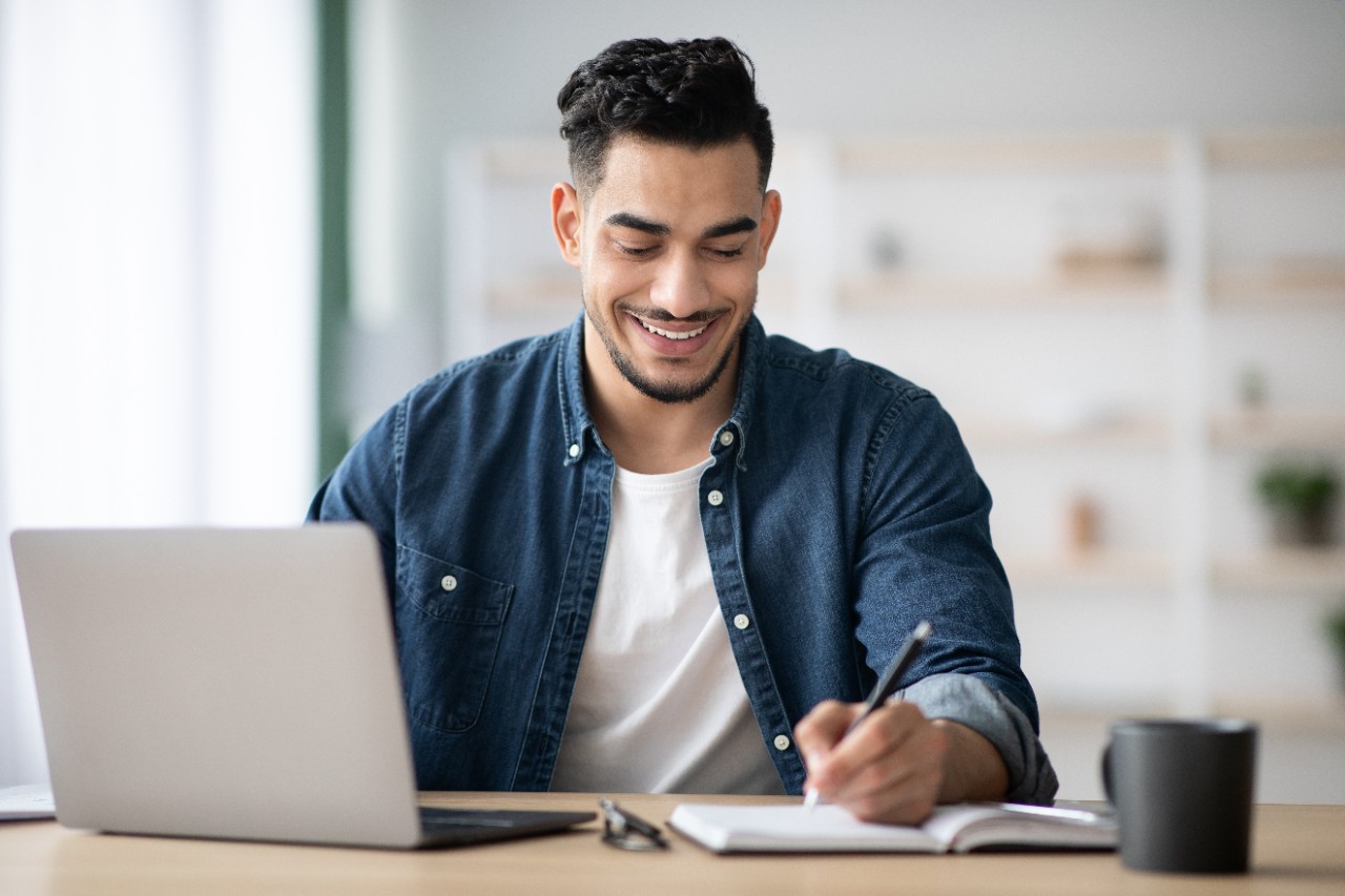 Man studying with laptop